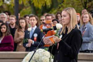 Katie Berrell speaks about her uncle during a ceremony at the Place of Remembrance