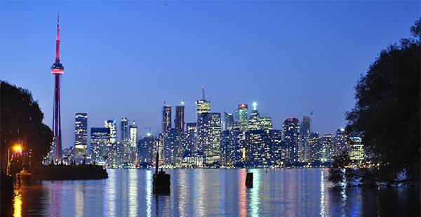 Night photo of the Toronto skyline and harbour