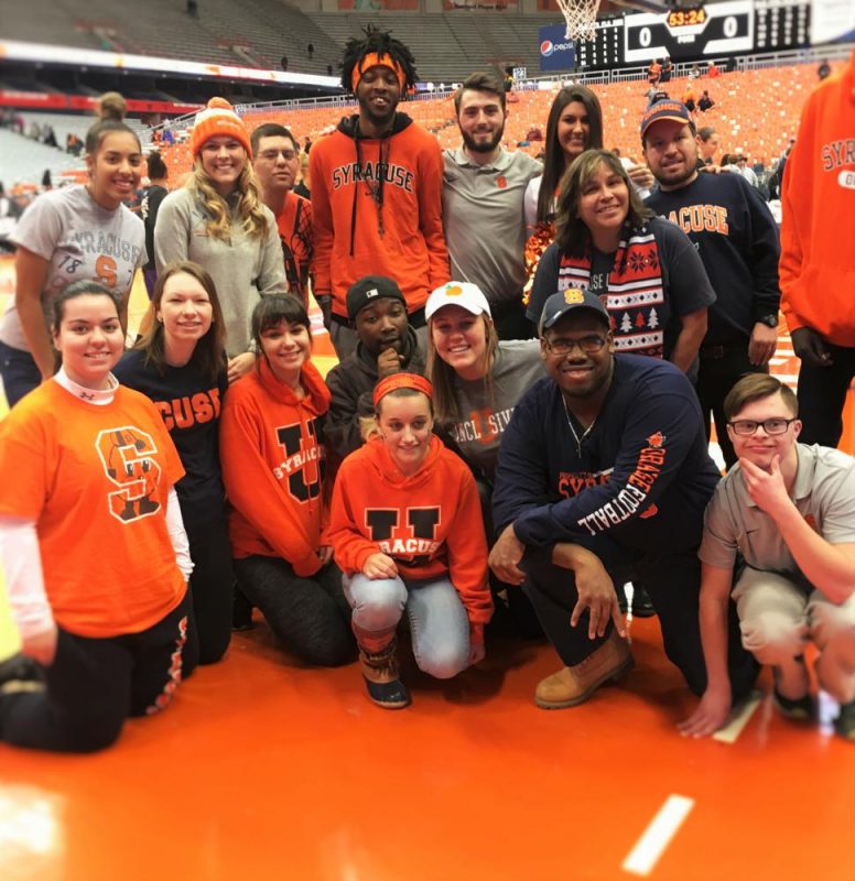 Inclusive U students on the Syracuse basketball court