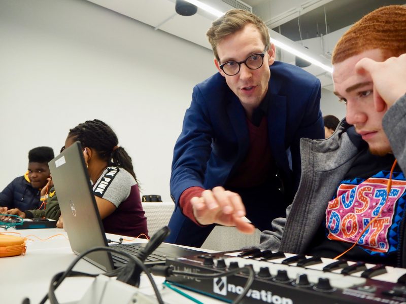 David Knapp works with students from the Leadership and Public Service High School in New York City.