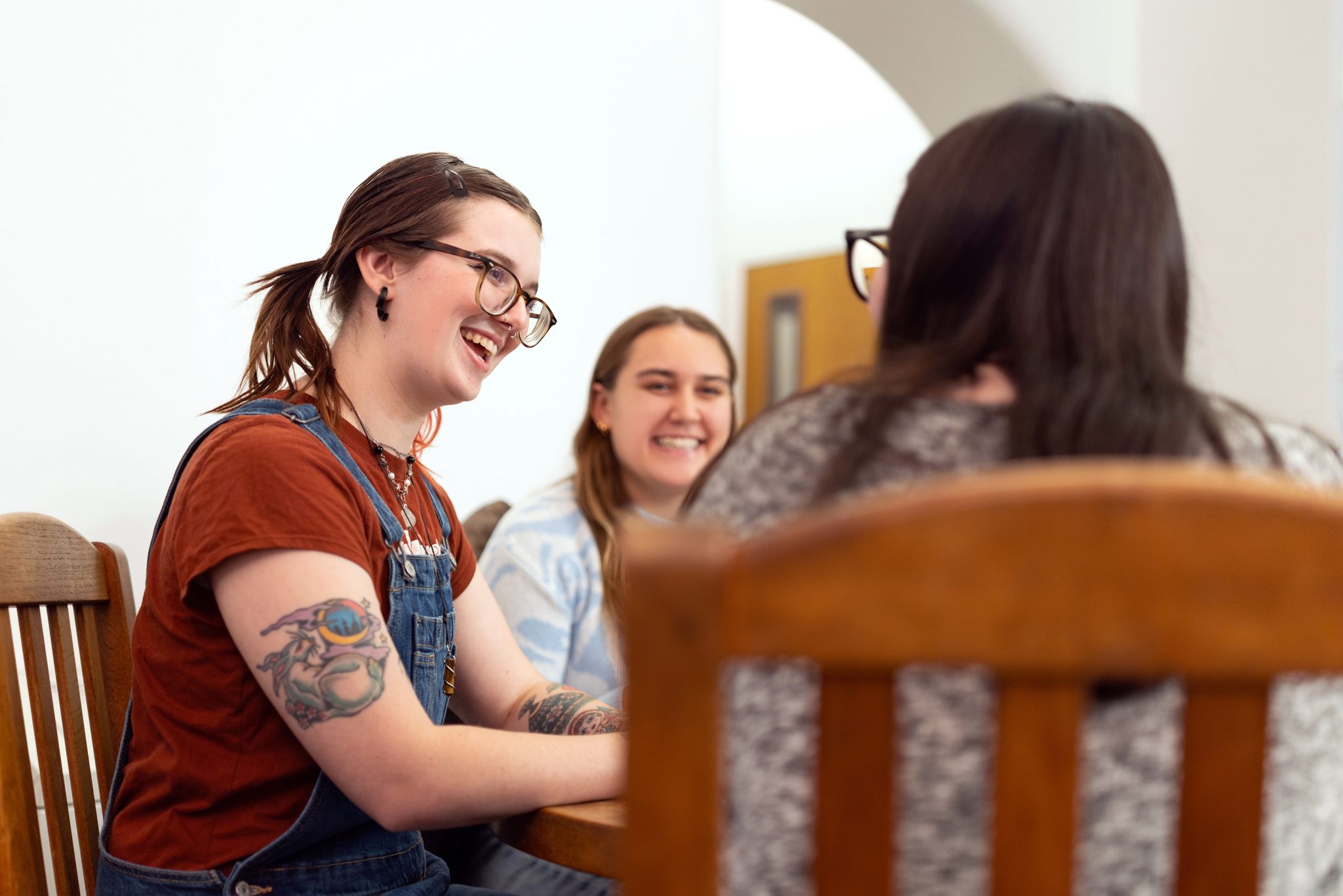 School of Education students Souky, Julianna Tsokanos, Laura Danehy study together in Huntington Hall, fall 2023.
