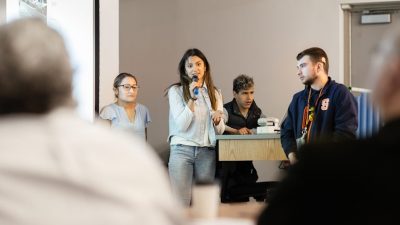 A group of students give a presentation