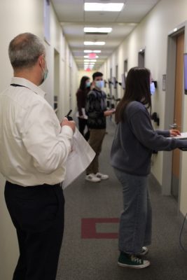 School of Education students log in at computer waiting for clinical simulations to begin.