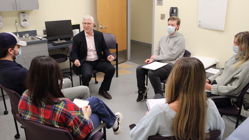 School of Education students debrief after performing clinical simulations.