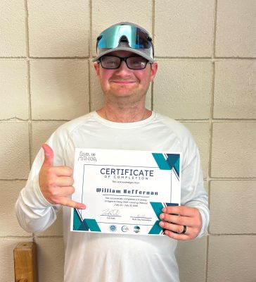 will holds his participation certificate