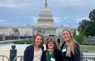 Brianna Shults G’20, Olivia Baist ’22, and Katie Ducett in fronmt of Capitol