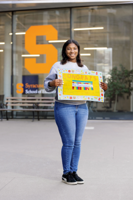 Kamille Montgomery portrait outside Syracuse University School of Education