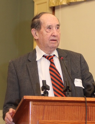 Jim Stonme stands at a podium