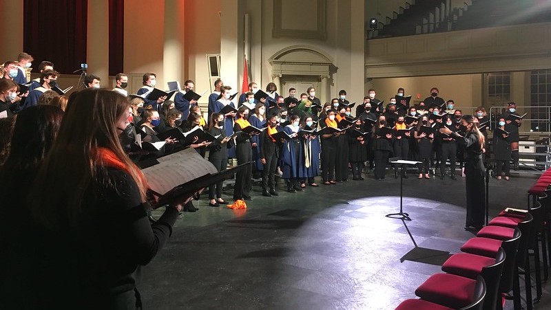 Jenny Wong conducts a Syracuse University choir