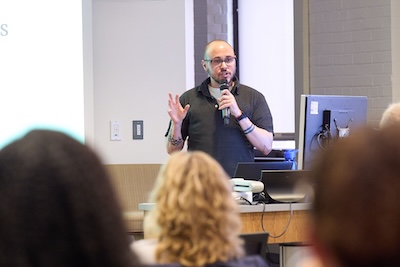 A student delivers a lecture