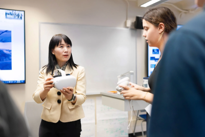 A professor explains a VR headset