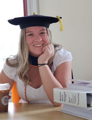 Katie Ducett in graduation garb