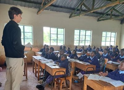 A student teacher teaching at a rural school in Kenya