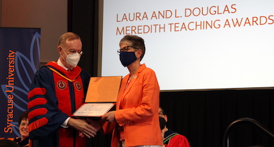 Leela George accepting her Meredith award