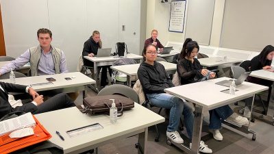 Whitman School students await clinical simulations in a classroom