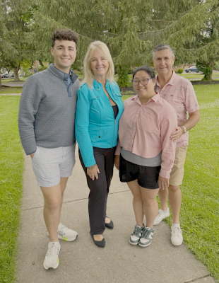 The Payne Family stand for a portrait