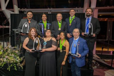 A group of American Indian athletes pose for a photo