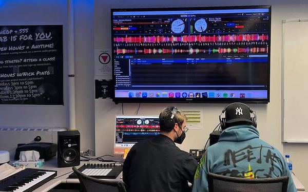 Students at a SENSES Project mixing desk