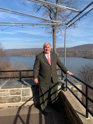 A man stands on a fishing dock
