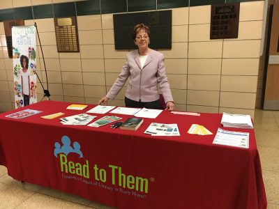 curcio tabling for read to them at a community event