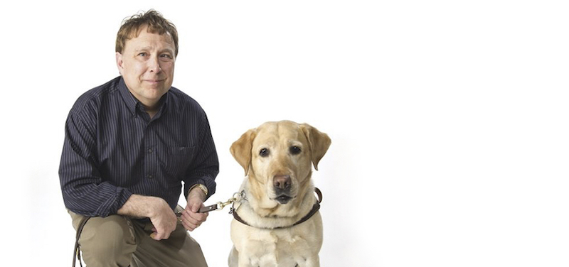 Stephen Kuusisto with his guide dog